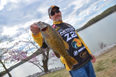 BPS veteran Tracy Adams shows off a bright Day 1 smallie. Photo by Joel Shangle.